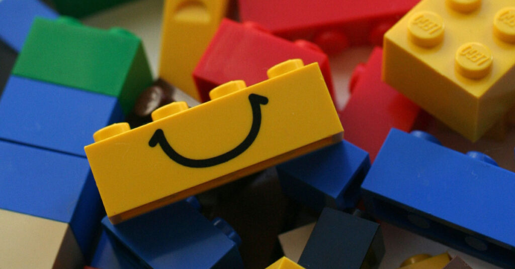 A smiling building block